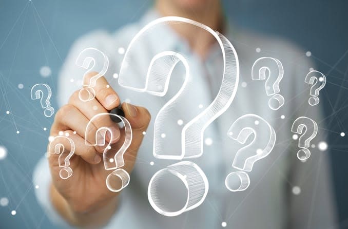 person drawing question marks person drawing question marks