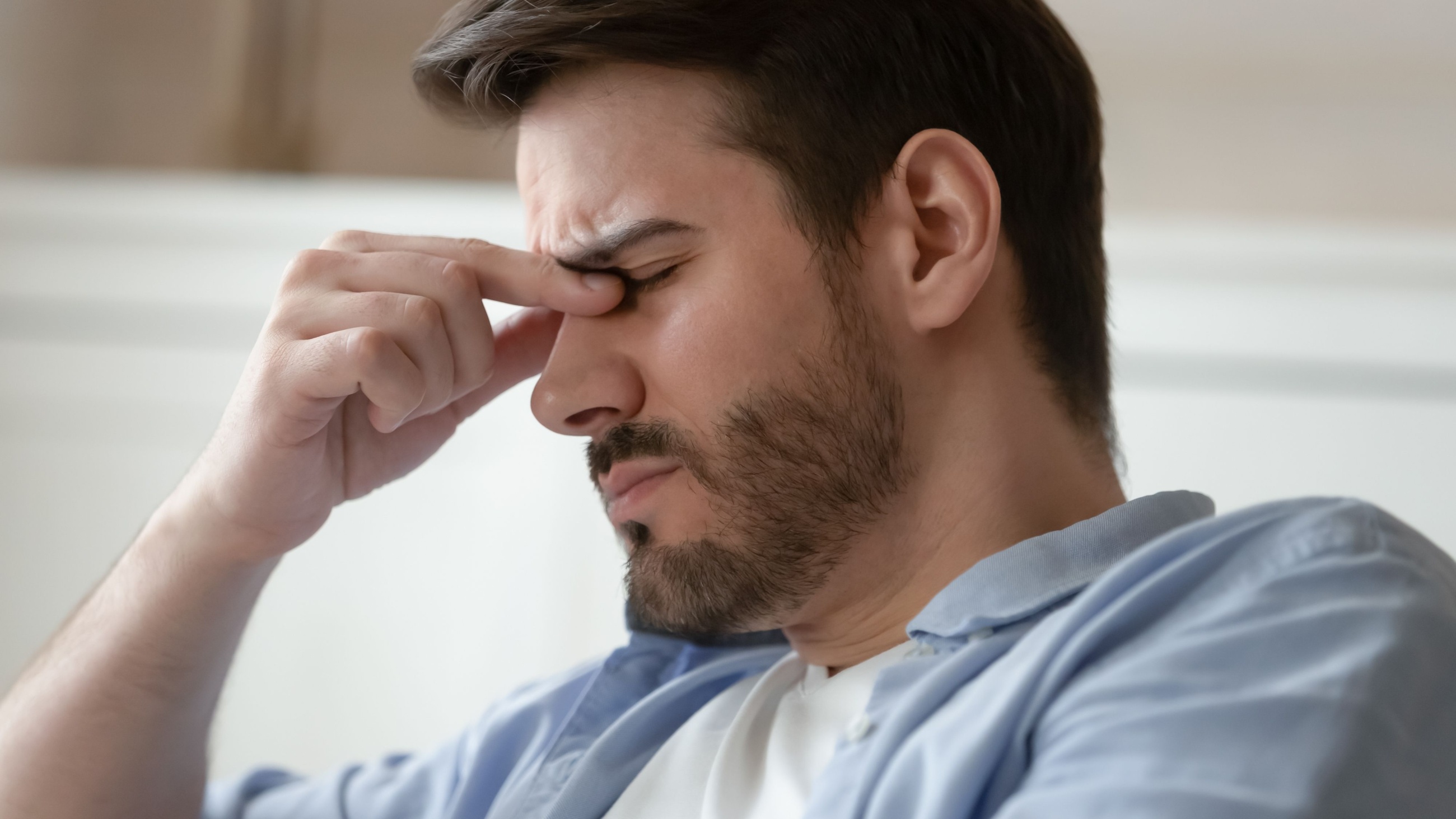 man with eye pain