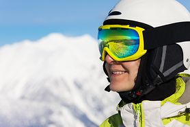 person in ski goggles and helmet
