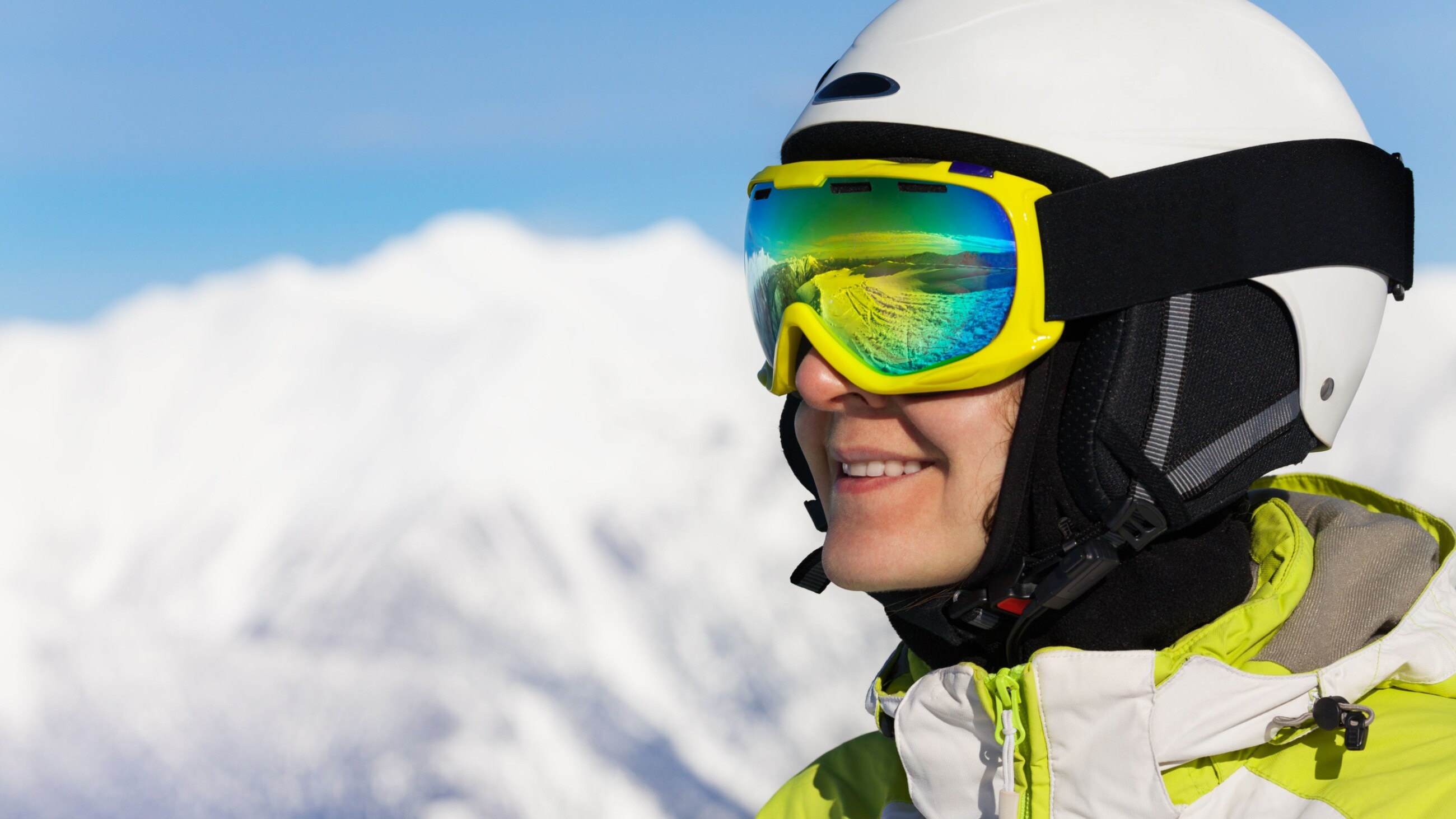 person in ski goggles and helmet