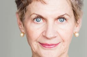 Older woman with bright blue eyes
