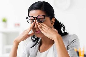 Woman rubbing her eyes to deal with eyelid twitching