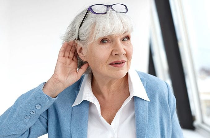 Mature woman having a hard time hearing
