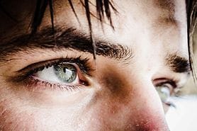 closeup of man with green eyes