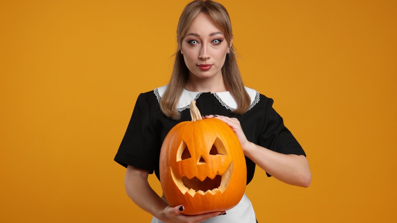 woman in halloween costume with specialty contact lenses woman in halloween costume with specialty contact lenses