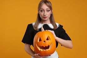 Mom wearing halloween contacts taking selfie with son