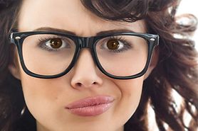 Unhappy woman with eyeglasses