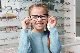 girl in glasses shop