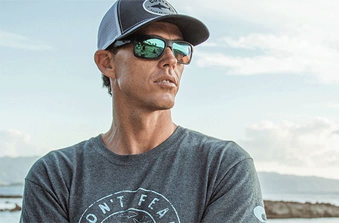 man wearing Costa sunglasses man wearing Costa sunglasses
