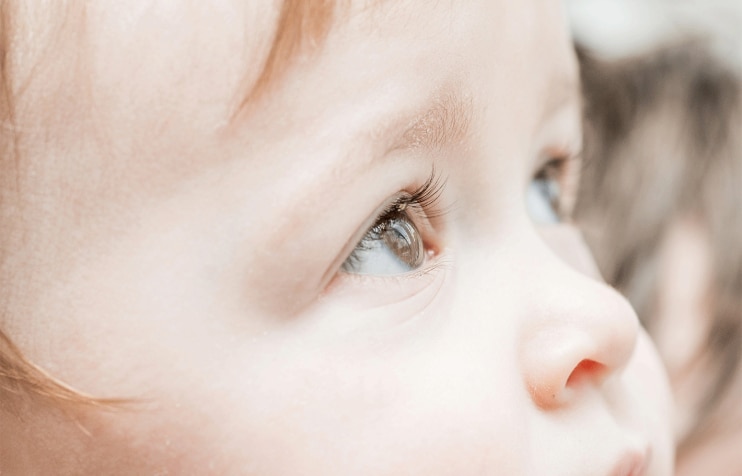 Close-up of child's eyes looking upward. Close-up of child's eyes looking upward.
